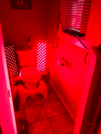 red light therapy setup in a bathroom